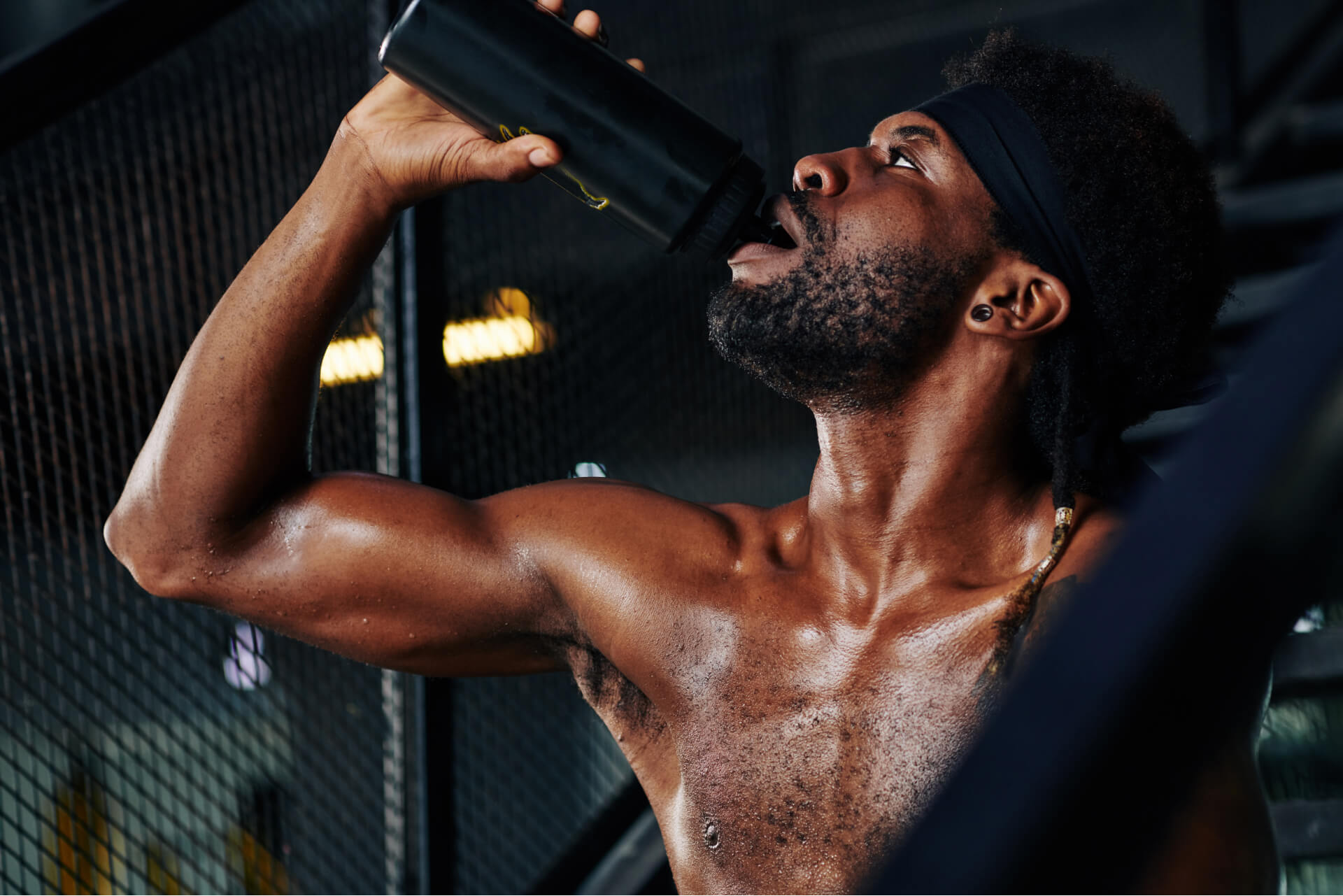 Man In Sweat Drinking Water 2023 11 27 05 10 14 Utc